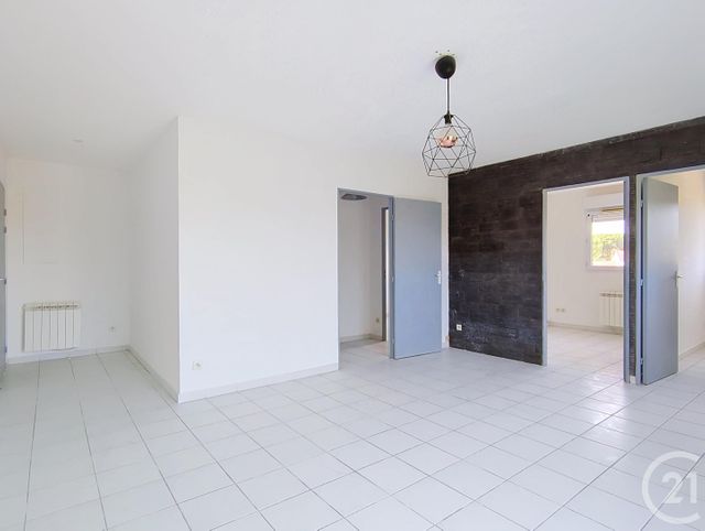 Appartement à louer - 2 pièces - 53.64 m2 - BAGNOLS SUR CEZE - 30 - LANGUEDOC-ROUSSILLON - Century 21 La Big