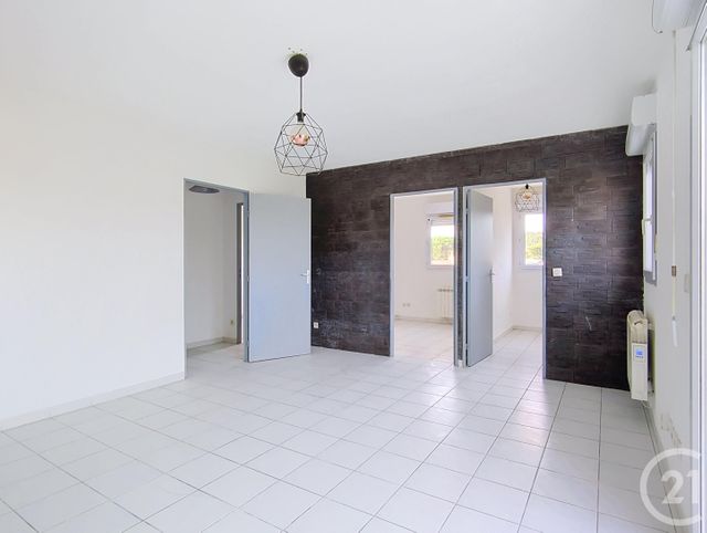 Appartement à louer - 2 pièces - 53.64 m2 - BAGNOLS SUR CEZE - 30 - LANGUEDOC-ROUSSILLON - Century 21 La Big